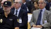 FRAUDE. Rodrigo Rato y Miguel Blesa sentados en el banquillo durante el juicio.