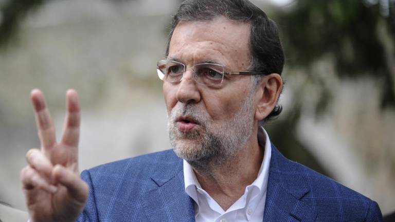 Un joven agrede a Rajoy en un paseo electoral en Pontevedra