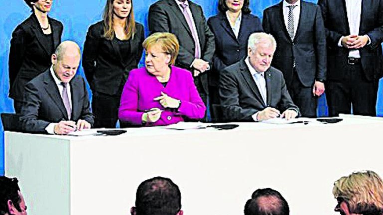 Merkel y SPD sellan el contrato de coalición para formar gobierno
